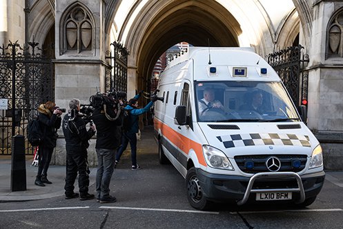 Members of the media look on as a prison van carries convicted rapist John Worboys from the High Court on February 7, 2018 in London, England. A judicial review hearing on March 13 allowed victims to challenge his planned release.