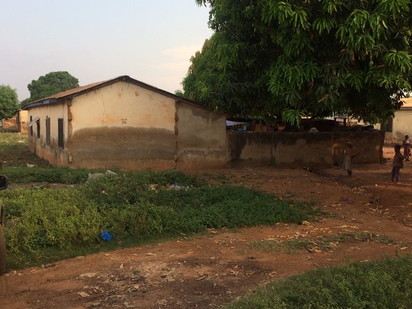 A house in Tamale with visible damage from floods in previous years