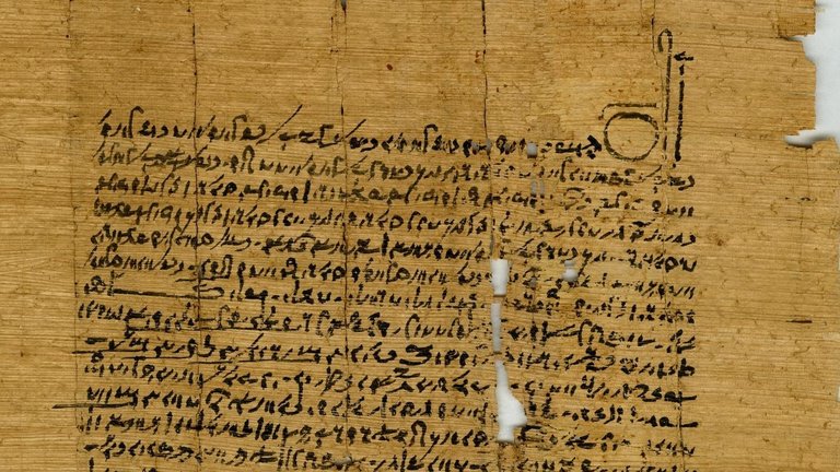 Photograph of detail of ancient Egyptian script on papyrus held at the British Museum
