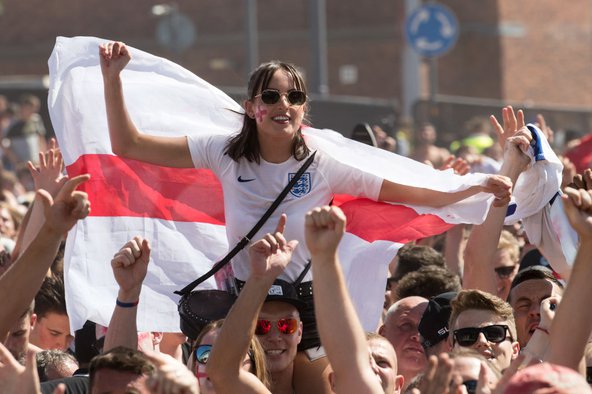   Football fans in Bristol watch England take on Sweden in the World Cup Quarter Finals on 7th July. Image credit: Matt Cardy / Getty Images.
